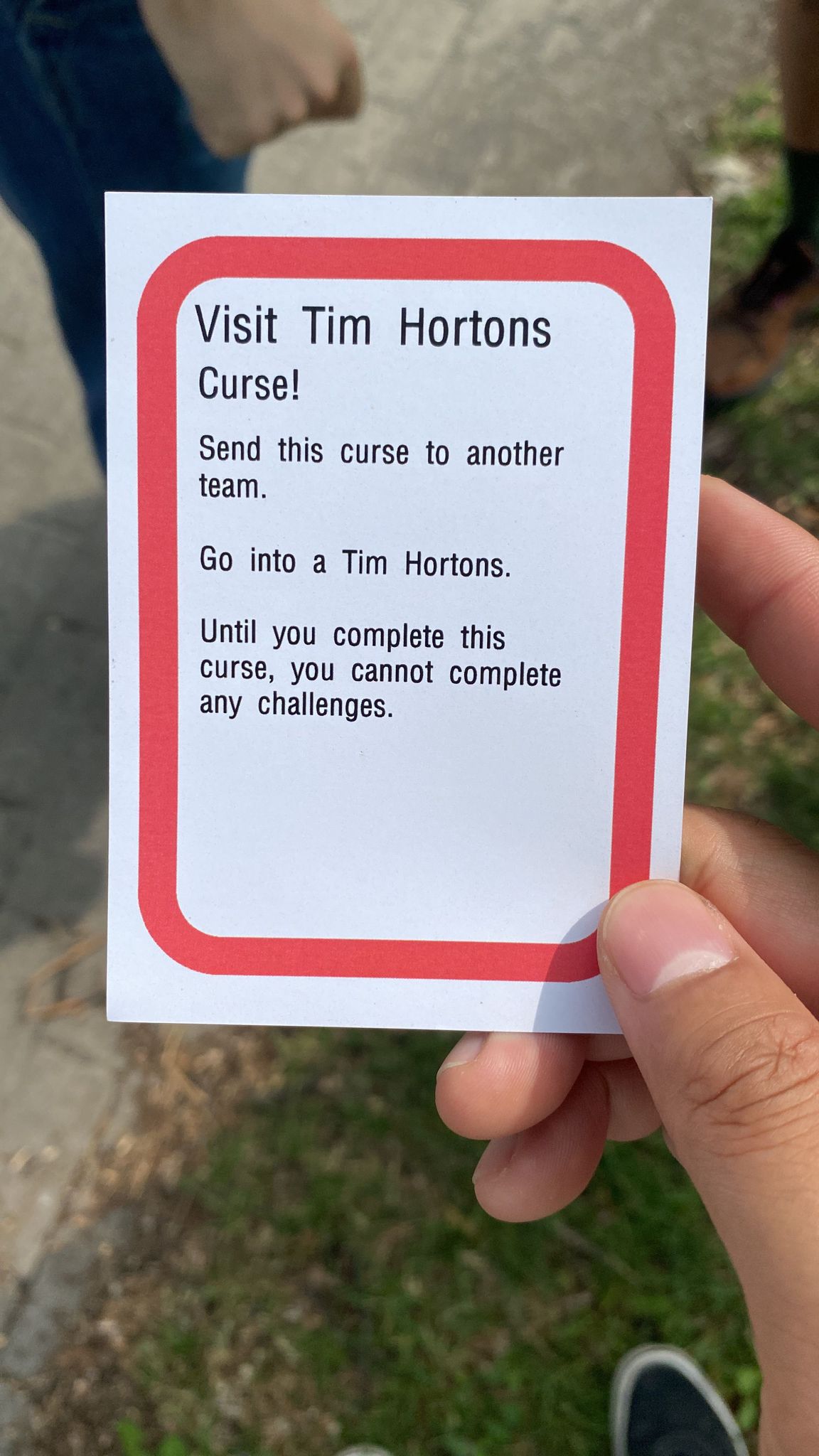 Visit a Tim Hortons curse card.